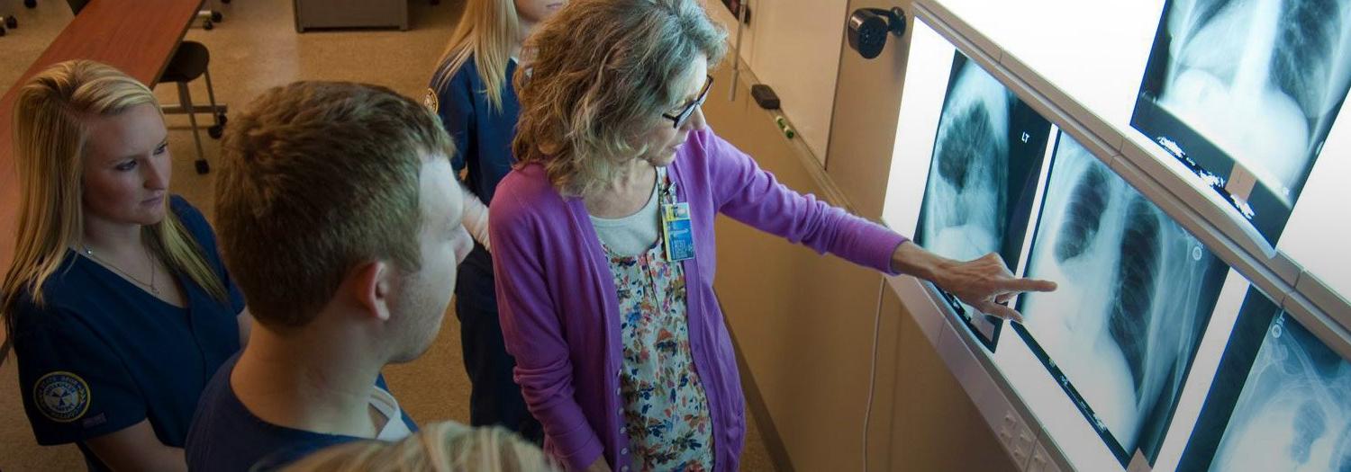 Respiratory students and professor viewing chest xrays