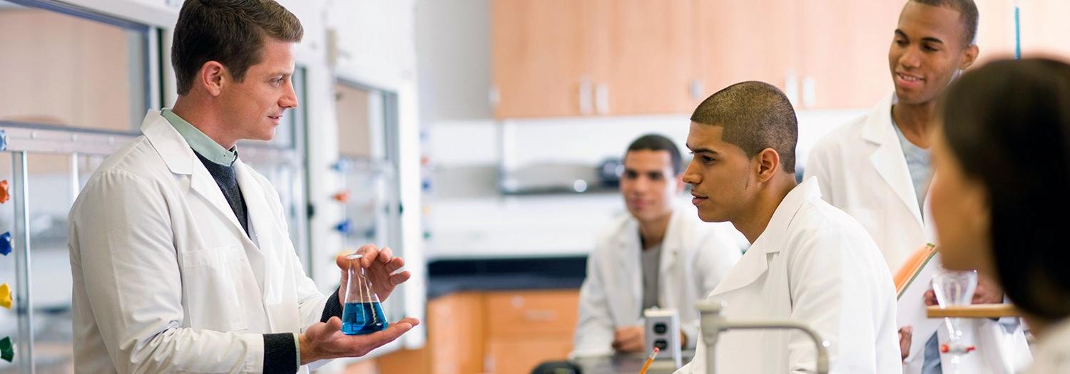 Five people in a lab environment