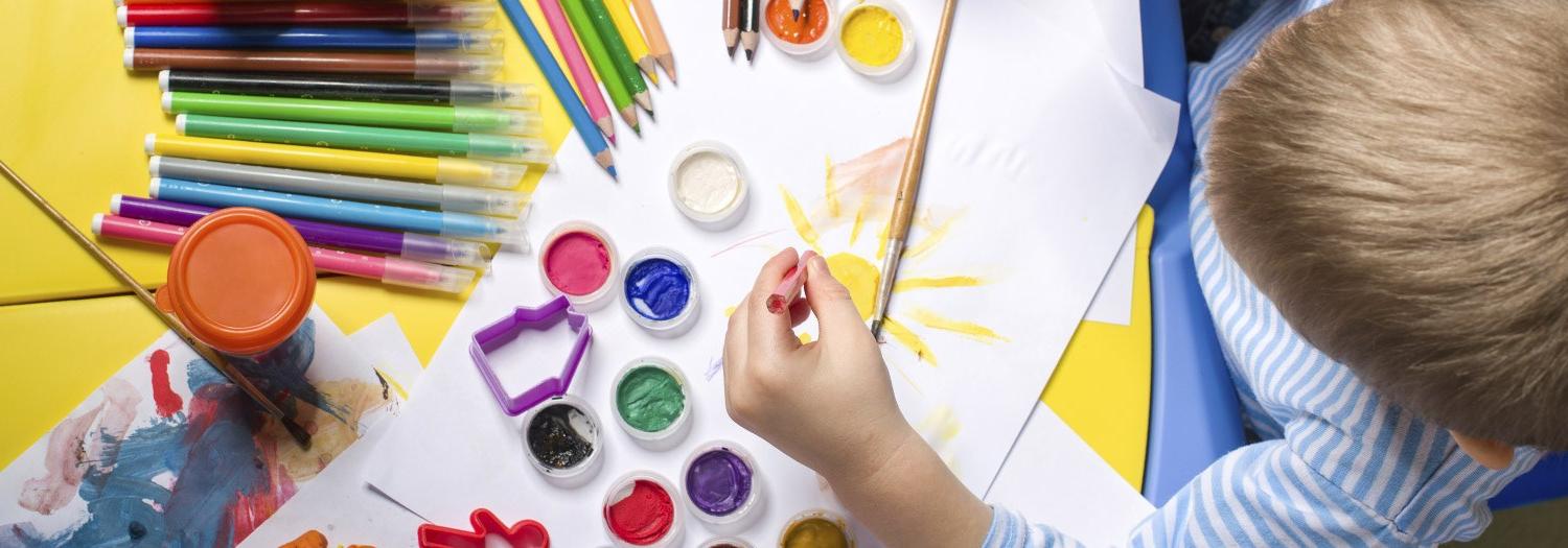 young boy painting